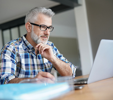 non traditional student using laptop