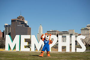 Pouncer in front of the giant MEMPHIS letters