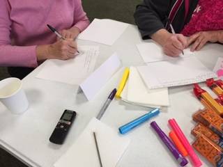 Deanna conducting a focus group for ALSAC