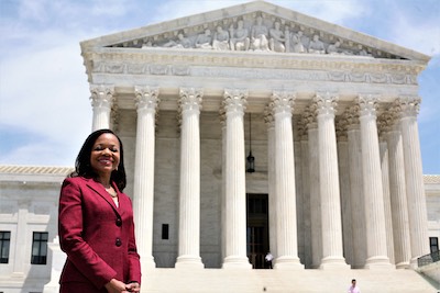 Kristen Clarke in front of Supreme Court