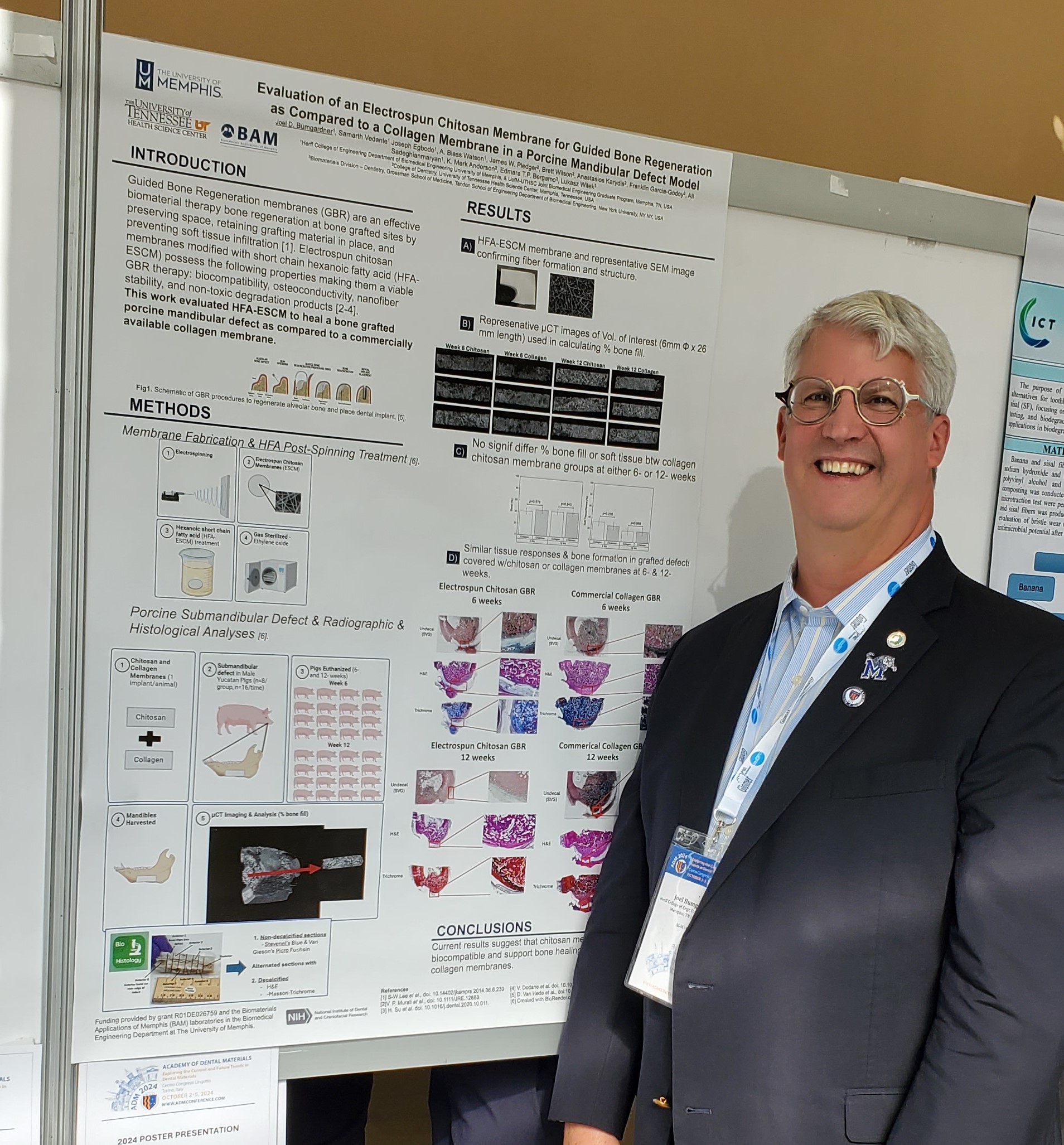 Joel Bumgardner with poster