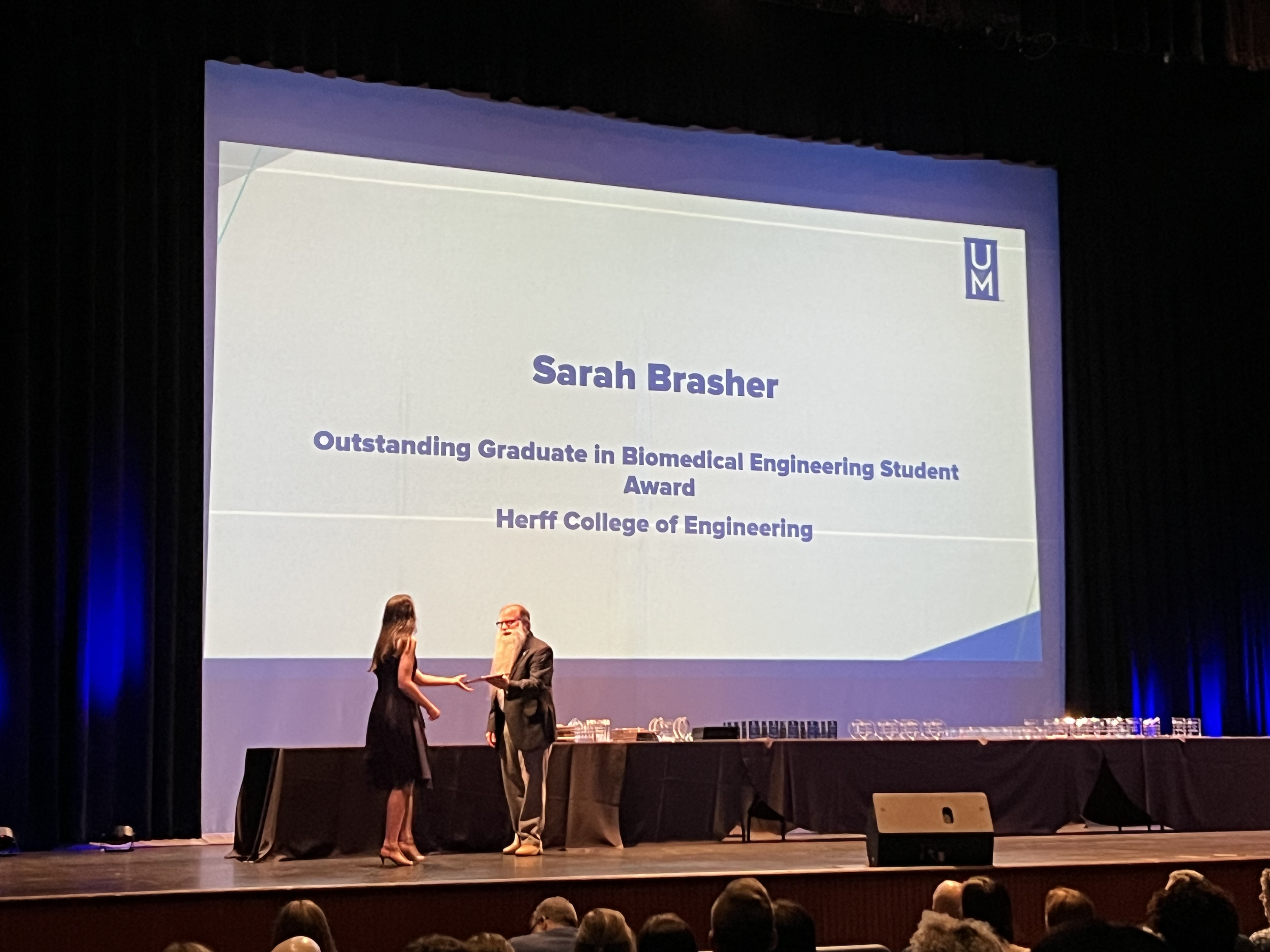 Sarah Brasher receiving award Sarah Brasher at award ceremony