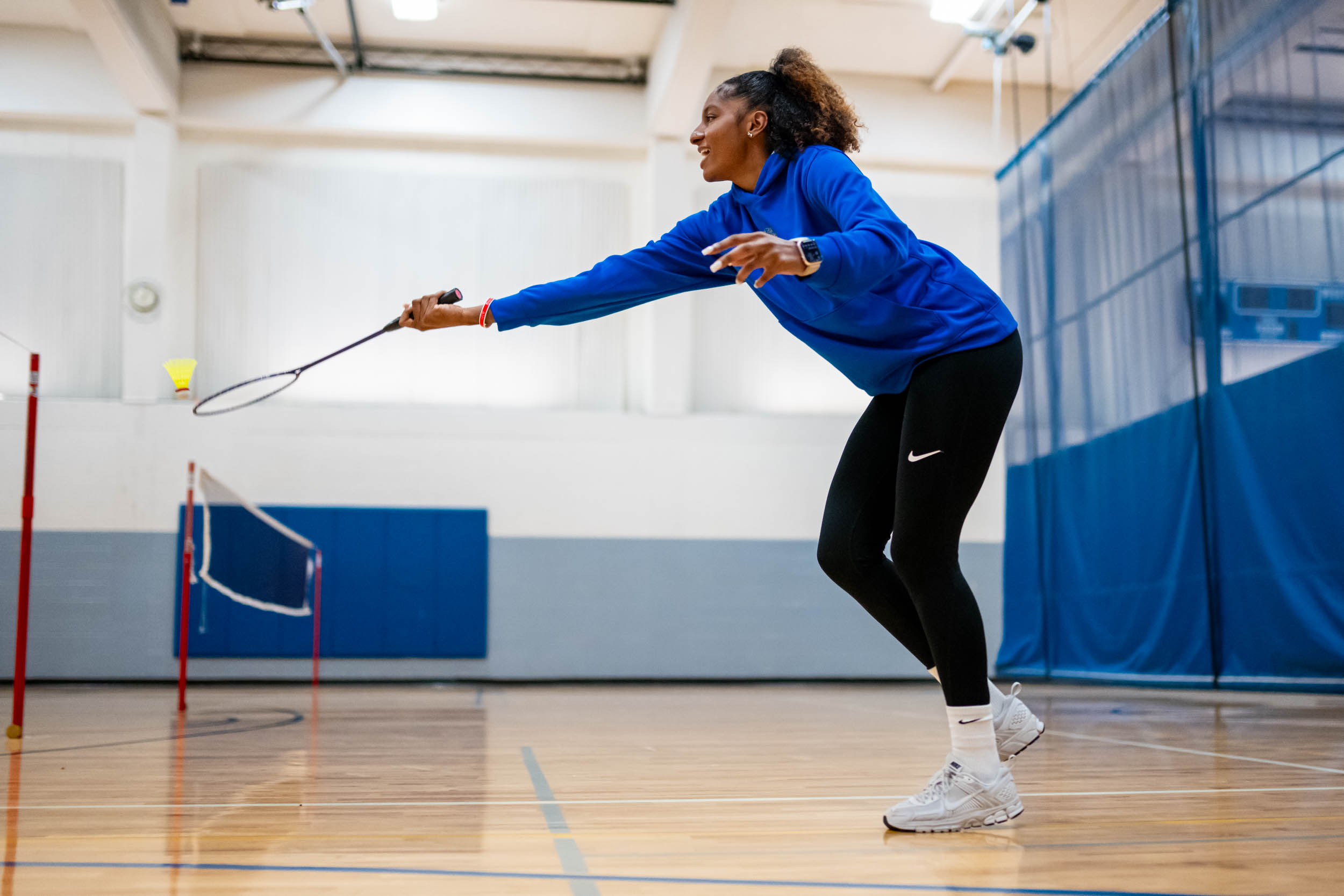 girl playing badminton