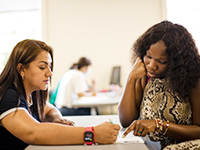 ISS team assisting student