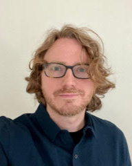 Daniel Comstock, PhD