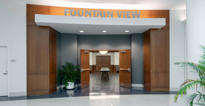 photo of the entrance to the Fountain View Suite showing open double doors leading to the Lounge 
