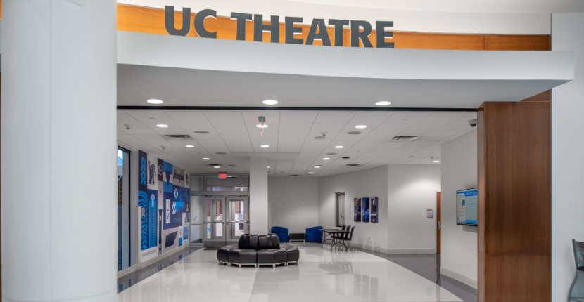 Entry area to UC Theatre showing small seating area and empty lobby
