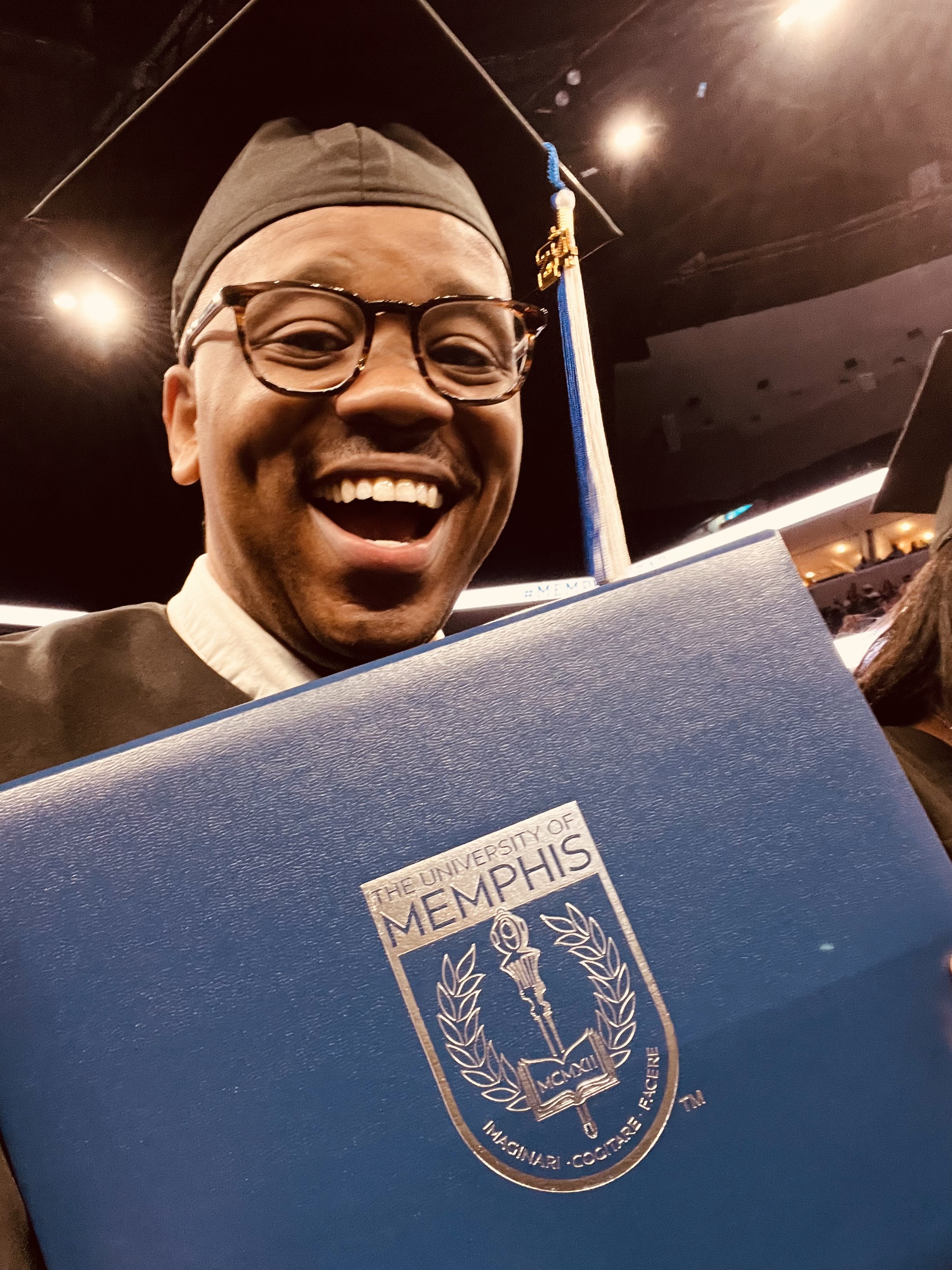 angela_g Finish Line graduate Johnny Webster holds his diploma