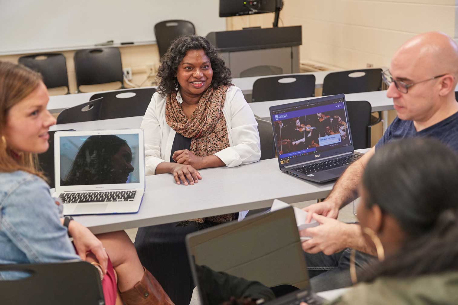 Dr. Edith Gnanadass with students