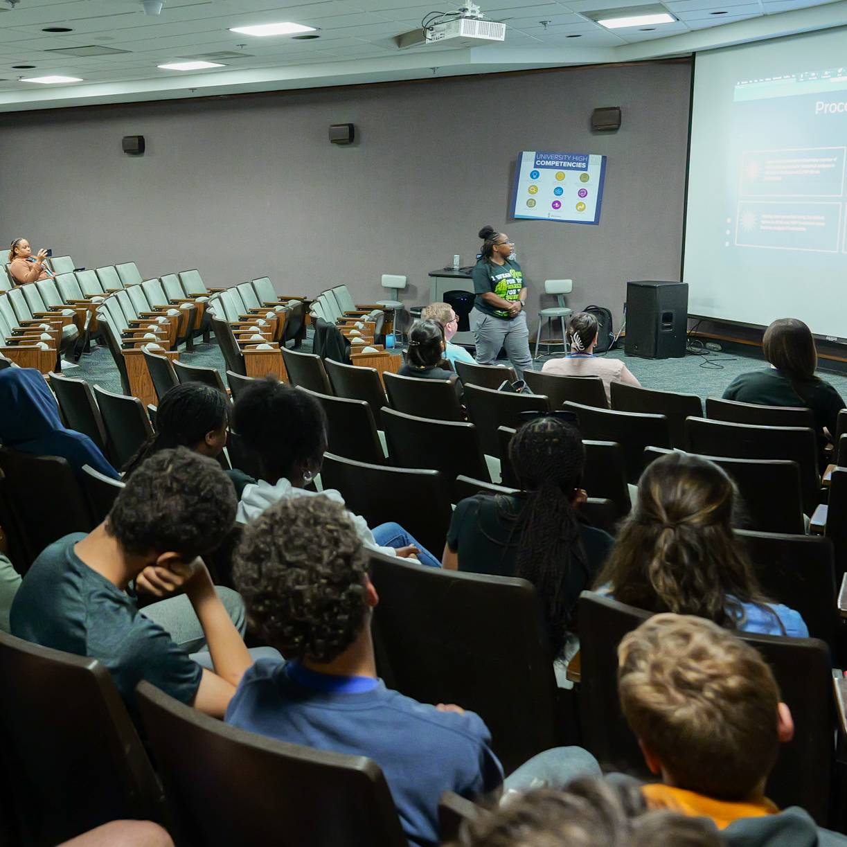 Campus Middle School students listen to dissertation defense from Dr. Ashely Boles