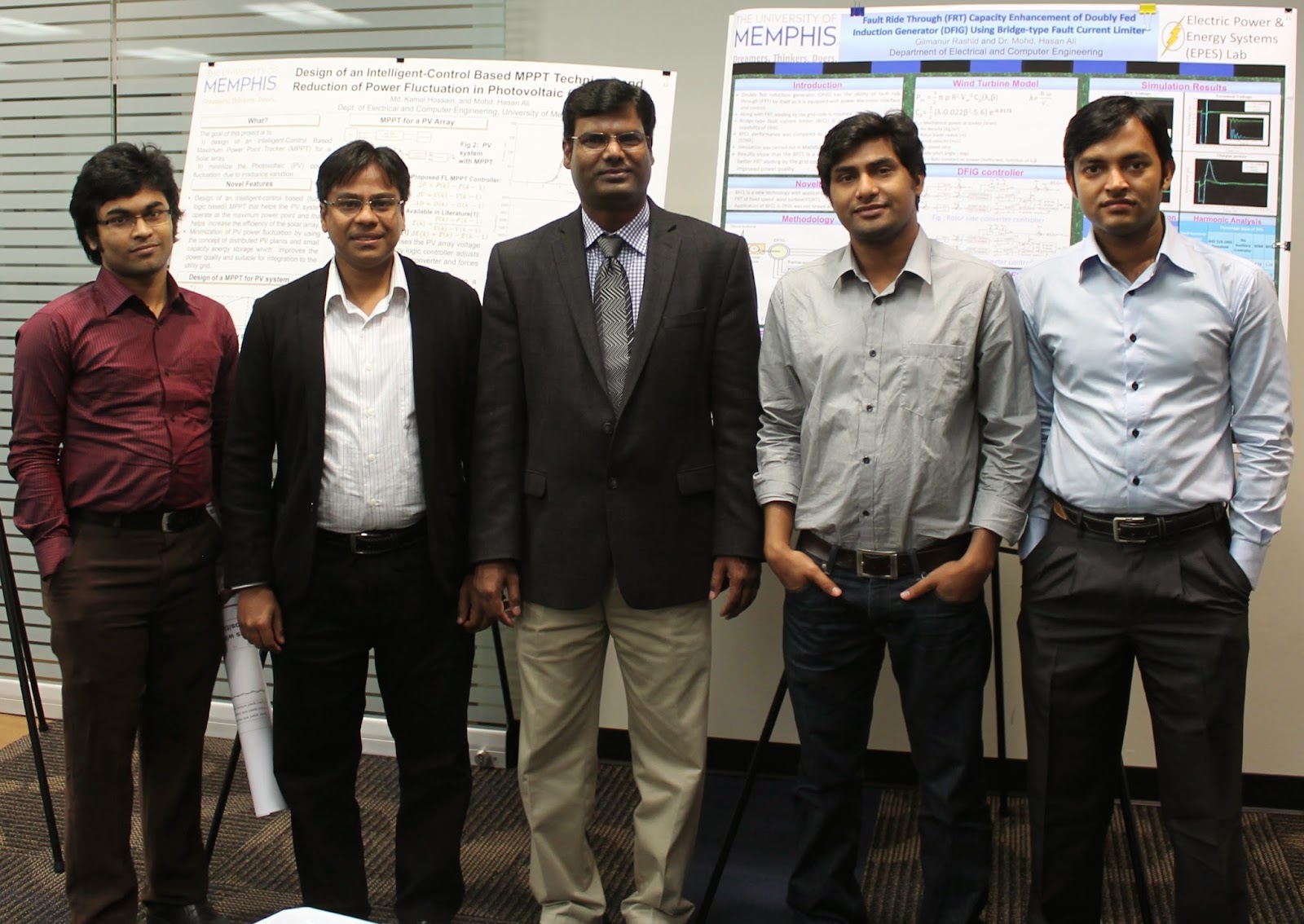 EPES Lab Members during poster presentation at the Smart Grid Workshop held at Fedex Institute of UofM, October 17, 2013