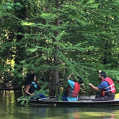 Field Techniques in Zoology students retrieve lure Field Techniques in Zoology students retrieve lure
