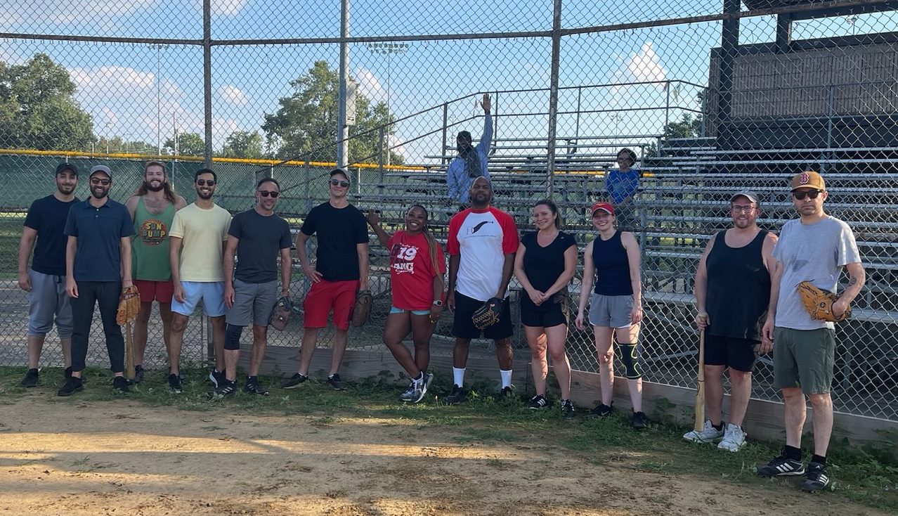 english graduate students at a softball game