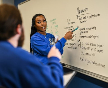 students at white board