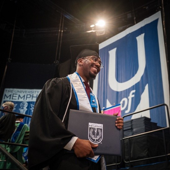 Student with diploma