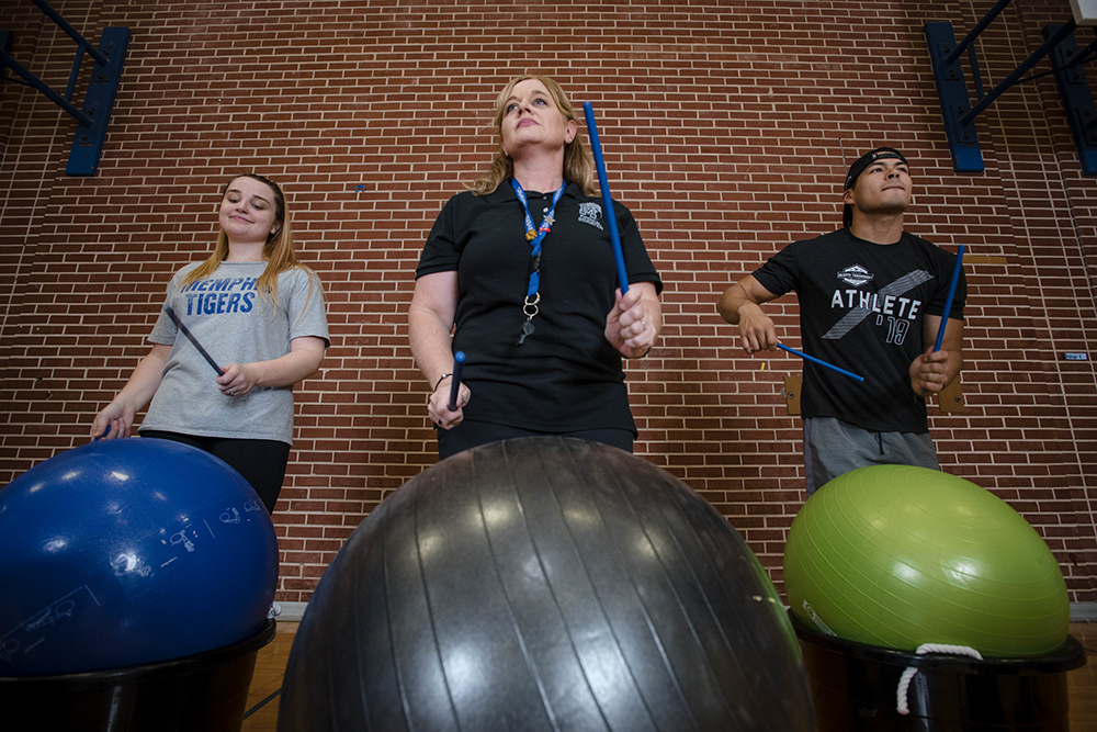 Becky Bocz in PETE class drumming Becky Bocz in PETE class drumming
