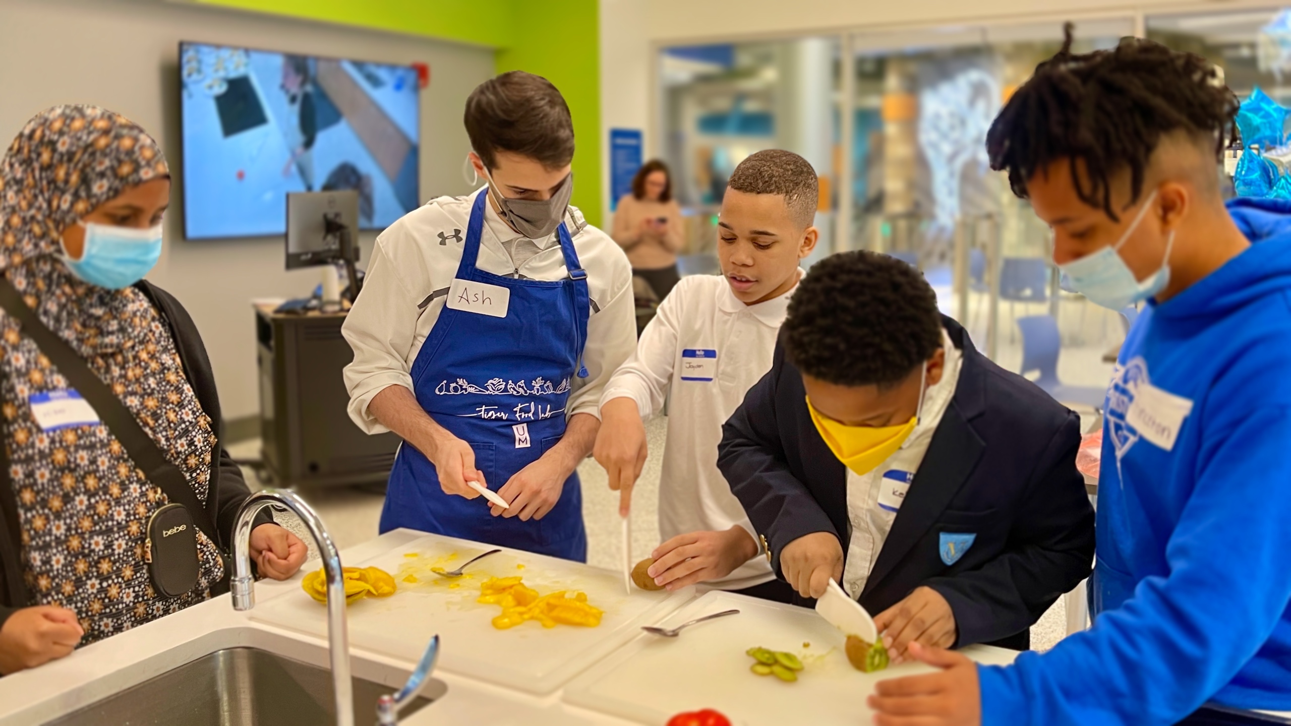Students learning to cook in Tiger Food Lab Food Fusion