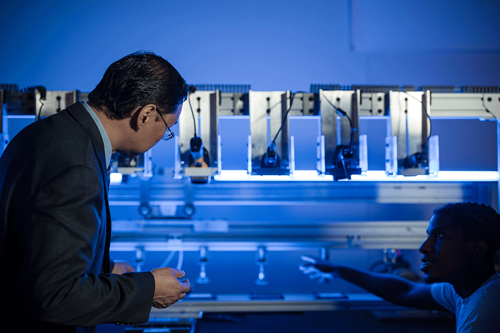 Berisso and student in AutoID lab