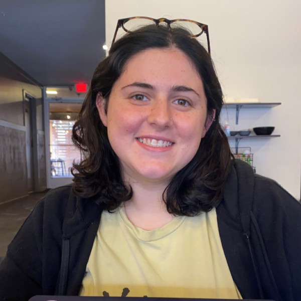 Image of alumni with glasses on head