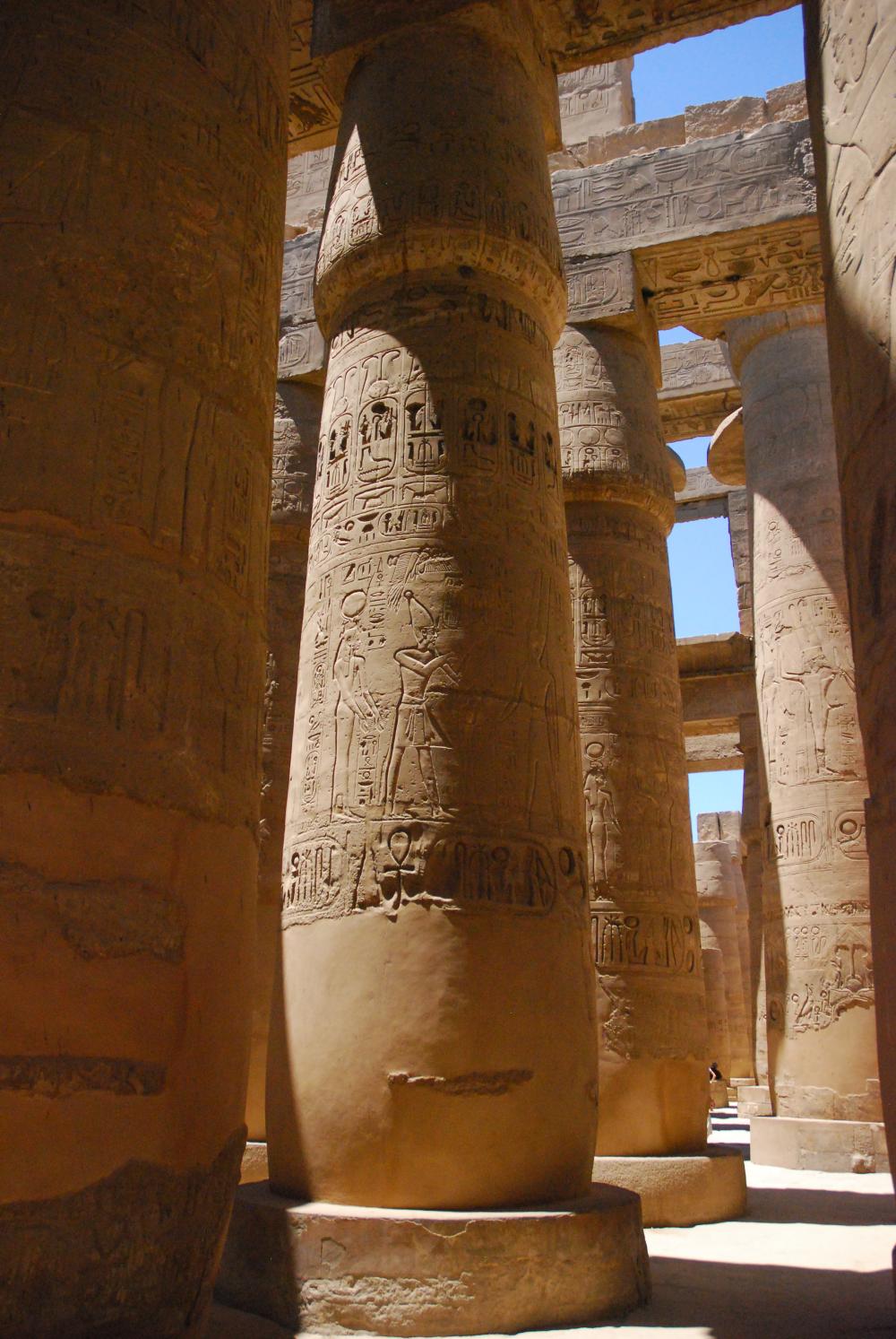 View of the larger columns with architraves still in situ and the remains of a clerestory window in the background (left) and smaller columns (right).