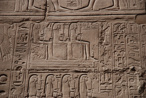 Plate 52 (B97-98) - Ramesses II receiving regalia and jubilees from Amun-Re in the presence of Mut and Khonsu, while Thoth inscribes years of reign (right, B97) and Iunmutef addresses the Great Ennead (left, B98)
