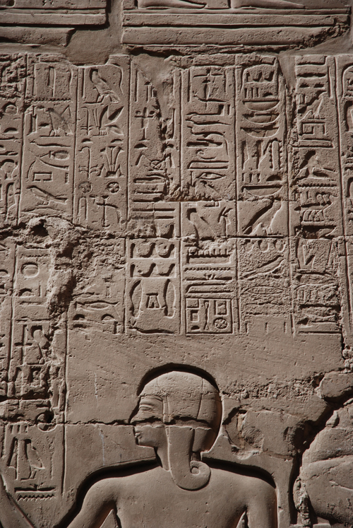 Plate 52 (B97-98) - Ramesses II receiving regalia and jubilees from Amun-Re in the presence of Mut and Khonsu, while Thoth inscribes years of reign (right, B97) and Iunmutef addresses the Great Ennead (left, B98)