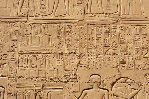 Plate 52 (B97-98) - Ramesses II receiving regalia and jubilees from Amun-Re in the presence of Mut and Khonsu, while Thoth inscribes years of reign (right, B97) and Iunmutef addresses the Great Ennead (left, B98)