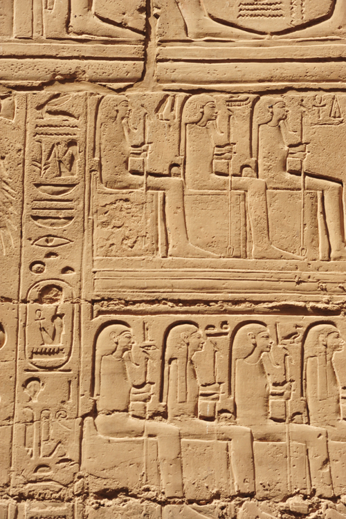 Plate 52 (B97-98) - Ramesses II receiving regalia and jubilees from Amun-Re in the presence of Mut and Khonsu, while Thoth inscribes years of reign (right, B97) and Iunmutef addresses the Great Ennead (left, B98)