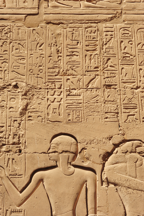 Plate 52 (B97-98) - Ramesses II receiving regalia and jubilees from Amun-Re in the presence of Mut and Khonsu, while Thoth inscribes years of reign (right, B97) and Iunmutef addresses the Great Ennead (left, B98)