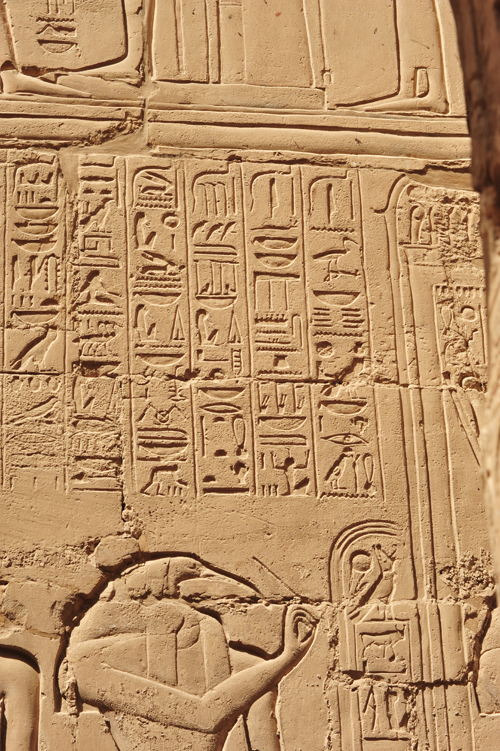 Plate 52 (B97-98) - Ramesses II receiving regalia and jubilees from Amun-Re in the presence of Mut and Khonsu, while Thoth inscribes years of reign (right, B97) and Iunmutef addresses the Great Ennead (left, B98)