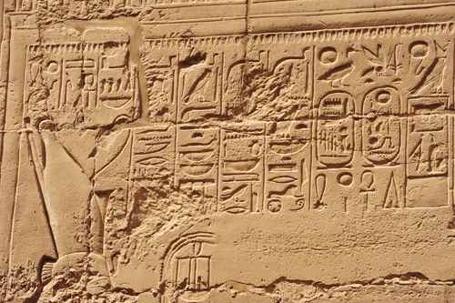 Plate 52 (B97-98) - Ramesses II receiving regalia and jubilees from Amun-Re in the presence of Mut and Khonsu, while Thoth inscribes years of reign (right, B97) and Iunmutef addresses the Great Ennead (left, B98)