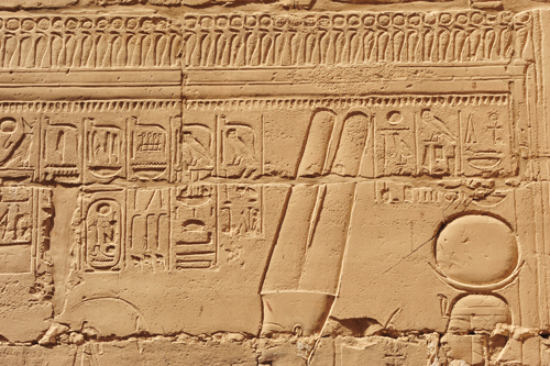 Plate 52 (B97-98) - Ramesses II receiving regalia and jubilees from Amun-Re in the presence of Mut and Khonsu, while Thoth inscribes years of reign (right, B97) and Iunmutef addresses the Great Ennead (left, B98)