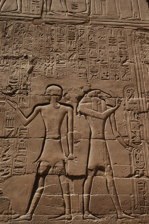 Plate 52 (B97-98) - Ramesses II receiving regalia and jubilees from Amun-Re in the presence of Mut and Khonsu, while Thoth inscribes years of reign (right, B97) and Iunmutef addresses the Great Ennead (left, B98)