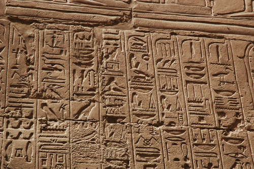 Plate 52 (B97-98) - Ramesses II receiving regalia and jubilees from Amun-Re in the presence of Mut and Khonsu, while Thoth inscribes years of reign (right, B97) and Iunmutef addresses the Great Ennead (left, B98)