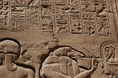 Plate 52 (B97-98) - Ramesses II receiving regalia and jubilees from Amun-Re in the presence of Mut and Khonsu, while Thoth inscribes years of reign (right, B97) and Iunmutef addresses the Great Ennead (left, B98)