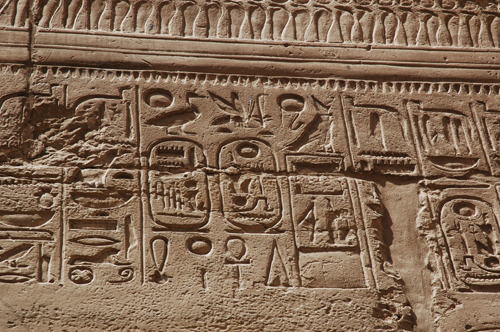Plate 52 (B97-98) - Ramesses II receiving regalia and jubilees from Amun-Re in the presence of Mut and Khonsu, while Thoth inscribes years of reign (right, B97) and Iunmutef addresses the Great Ennead (left, B98)