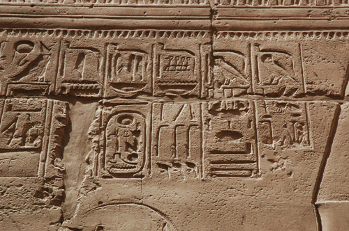 Plate 52 (B97-98) - Ramesses II receiving regalia and jubilees from Amun-Re in the presence of Mut and Khonsu, while Thoth inscribes years of reign (right, B97) and Iunmutef addresses the Great Ennead (left, B98)