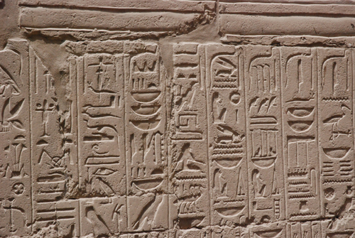 Plate 52 (B97-98) - Ramesses II receiving regalia and jubilees from Amun-Re in the presence of Mut and Khonsu, while Thoth inscribes years of reign (right, B97) and Iunmutef addresses the Great Ennead (left, B98)