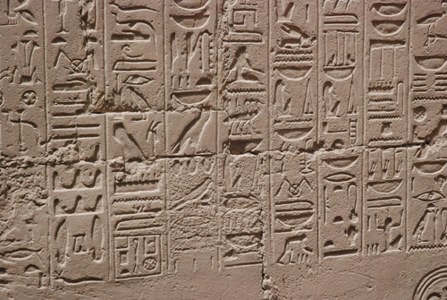 Plate 52 (B97-98) - Ramesses II receiving regalia and jubilees from Amun-Re in the presence of Mut and Khonsu, while Thoth inscribes years of reign (right, B97) and Iunmutef addresses the Great Ennead (left, B98)