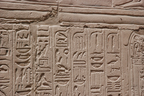 Plate 52 (B97-98) - Ramesses II receiving regalia and jubilees from Amun-Re in the presence of Mut and Khonsu, while Thoth inscribes years of reign (right, B97) and Iunmutef addresses the Great Ennead (left, B98)