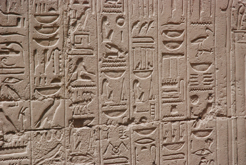 Plate 52 (B97-98) - Ramesses II receiving regalia and jubilees from Amun-Re in the presence of Mut and Khonsu, while Thoth inscribes years of reign (right, B97) and Iunmutef addresses the Great Ennead (left, B98)