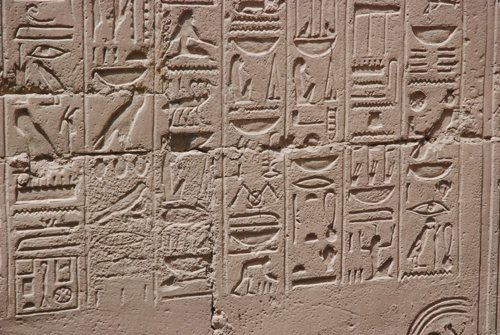 Plate 52 (B97-98) - Ramesses II receiving regalia and jubilees from Amun-Re in the presence of Mut and Khonsu, while Thoth inscribes years of reign (right, B97) and Iunmutef addresses the Great Ennead (left, B98)