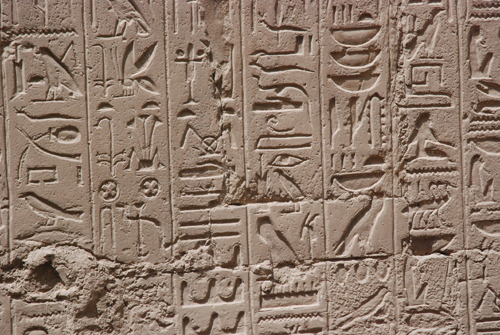 Plate 52 (B97-98) - Ramesses II receiving regalia and jubilees from Amun-Re in the presence of Mut and Khonsu, while Thoth inscribes years of reign (right, B97) and Iunmutef addresses the Great Ennead (left, B98)