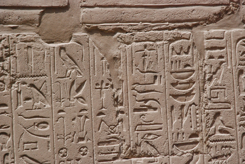 Plate 52 (B97-98) - Ramesses II receiving regalia and jubilees from Amun-Re in the presence of Mut and Khonsu, while Thoth inscribes years of reign (right, B97) and Iunmutef addresses the Great Ennead (left, B98)