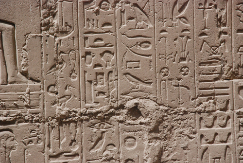 Plate 52 (B97-98) - Ramesses II receiving regalia and jubilees from Amun-Re in the presence of Mut and Khonsu, while Thoth inscribes years of reign (right, B97) and Iunmutef addresses the Great Ennead (left, B98)