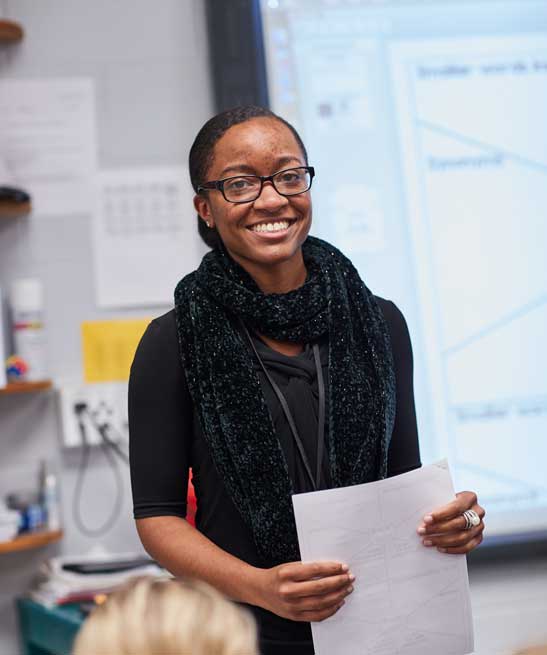 Teacher in front of classroom