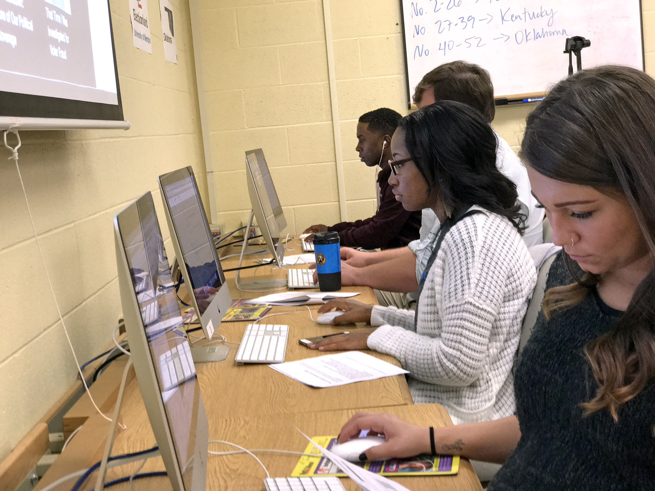 (PHOTOS BY ROBBY BYRD) Journalism students Jerrica James and Mary Katherine Langley monitor social media on Election Day seeking clues as to how the voting was proceeding in Tennessee, Kentucky and Oklahoma