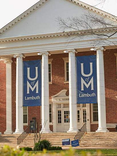 Carney Hal with UofM Lambuth Flags
