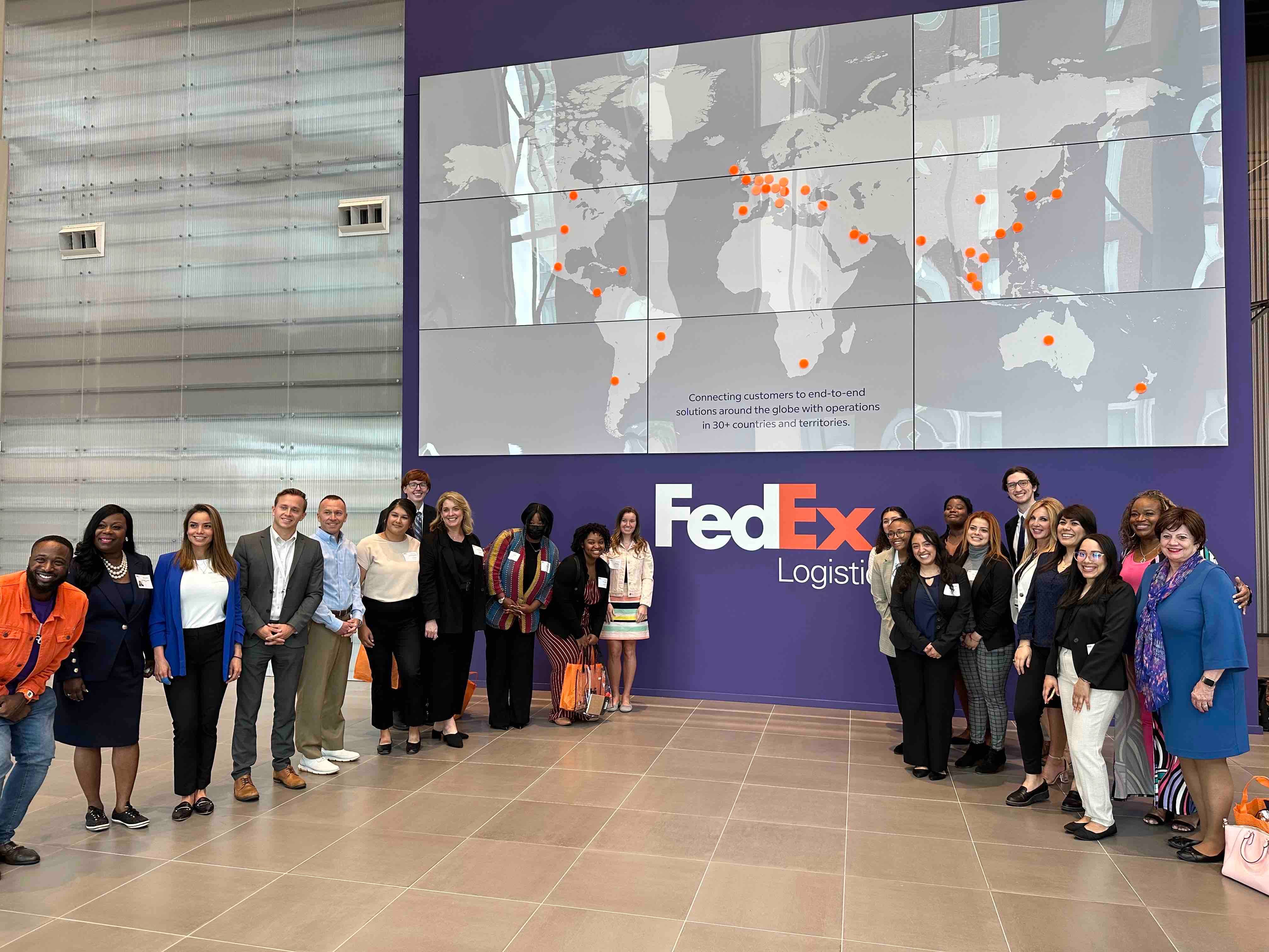 SHRM Student Chapter members posing with some of FedEx Logistics' HR employers!