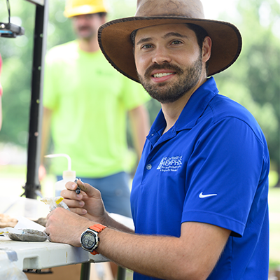 CAESER staff member collecting samples for research